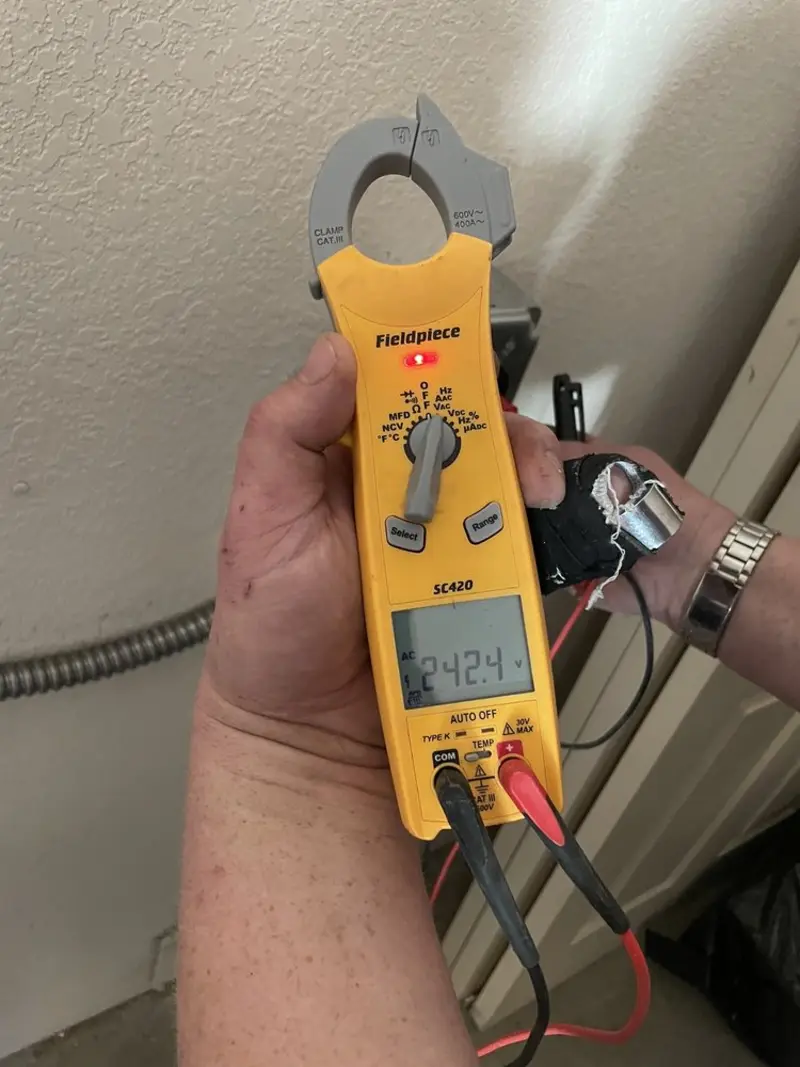 Voltage testing with clamp meter during Generator Installation in Hanover